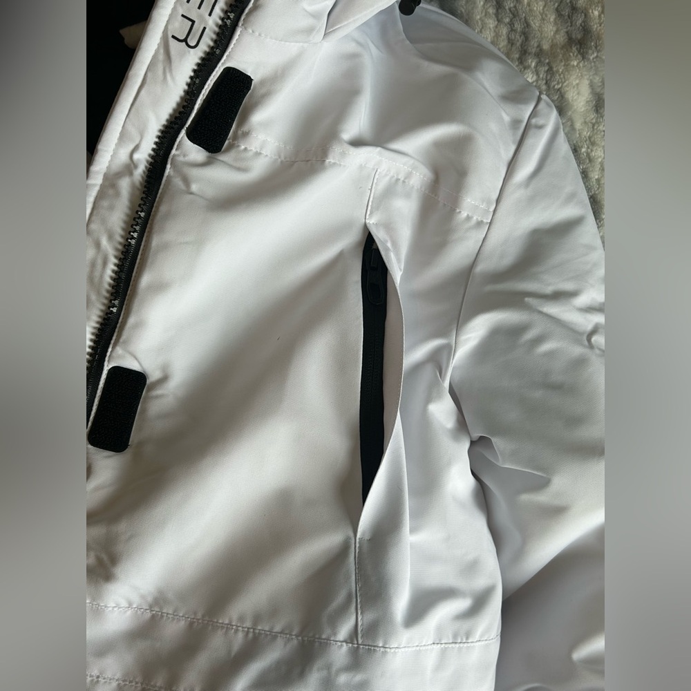 Spyder Women's White and Black long puffer jacket - Picture 9 of 16